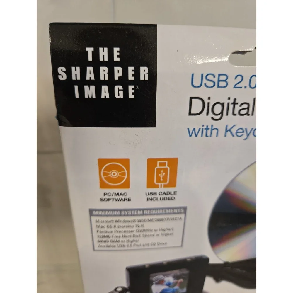 The Sharper Image Rechargeable USB 2.0 Digital Keychain Photo Album 1.4